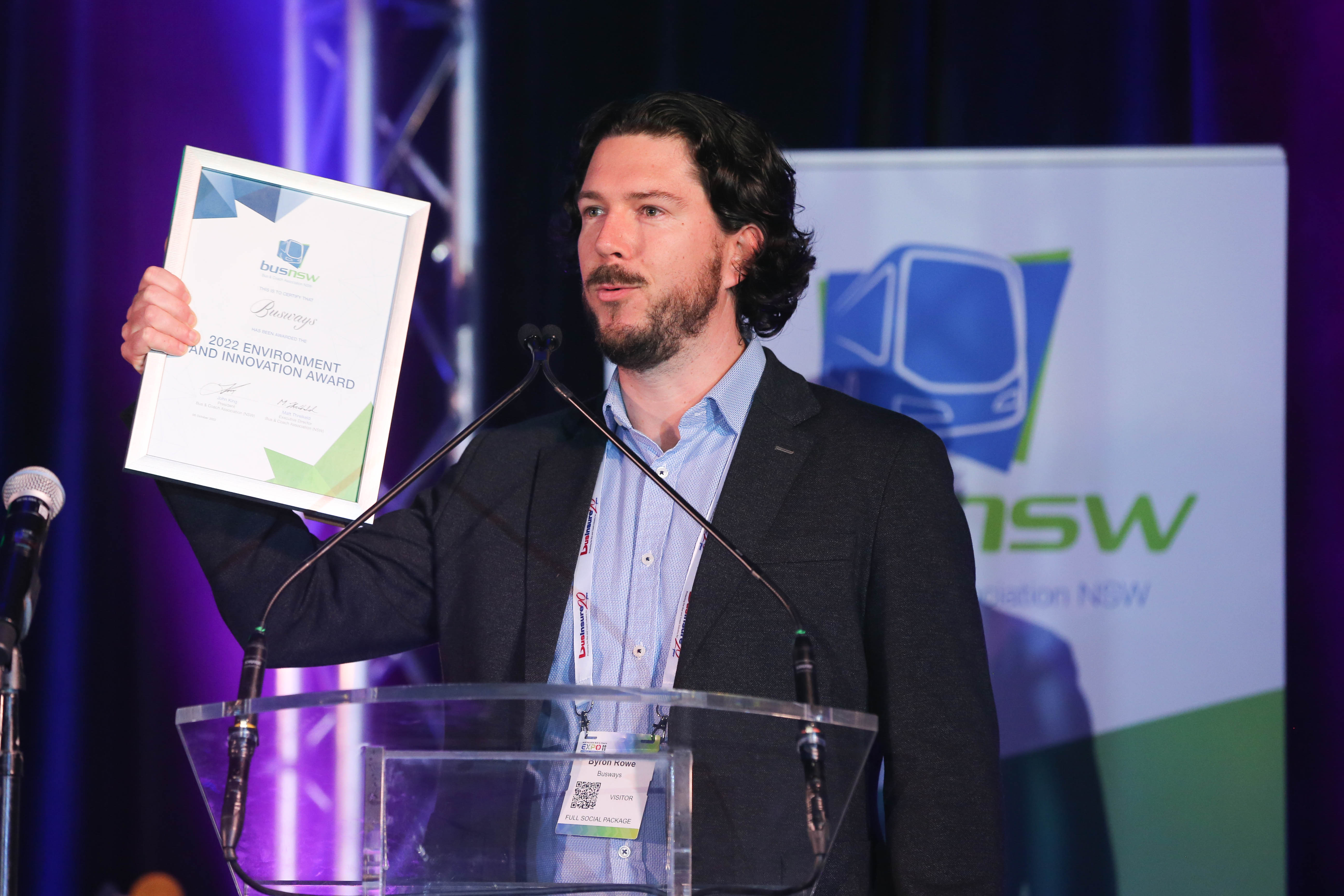 Busways Managing DIrector Byron Rowe accepts the award